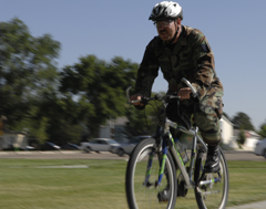 Figure 2. A Tech. Sgt. rides his bicycle 